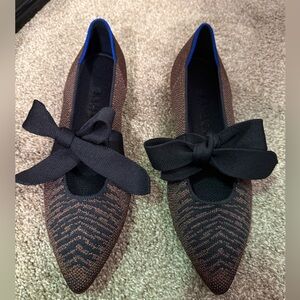 Rothy’s bow pointed flat. Brand new never worn.